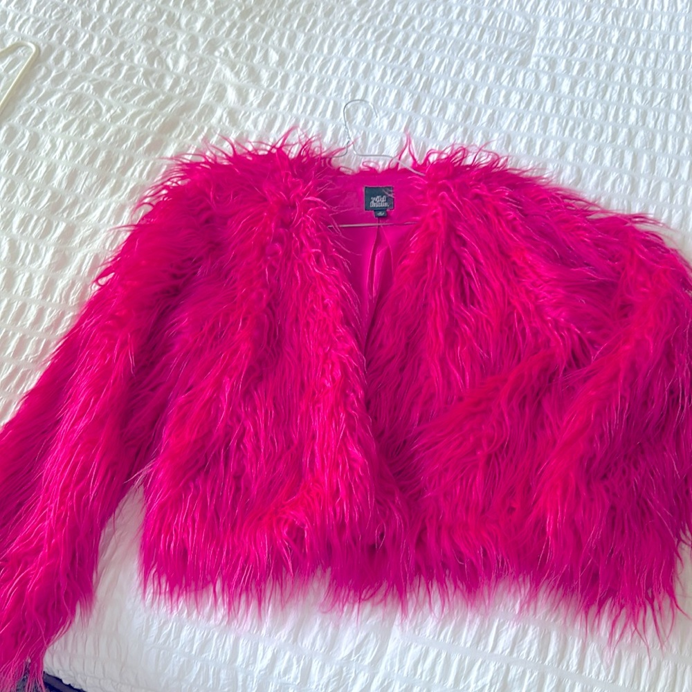 Women’s lined pink furry jacket.